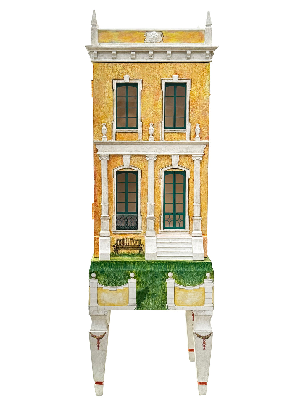 Front elevation of Piccolo Toscano, a hand-painted Tuscan miniature manor with an ochre façade, neoclassical columns, ornamental metalwork and a garden-inspired base.