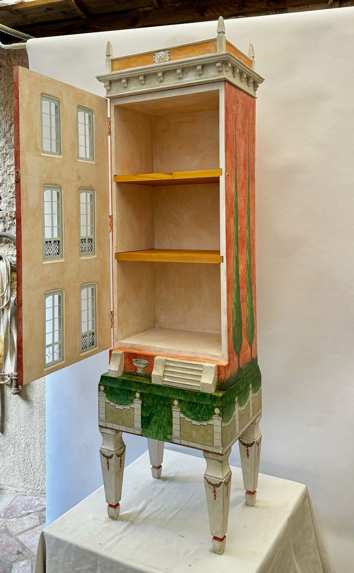 Open Cypress House dollhouse revealing miniature rooms, wooden floors and hinged façade ready for a collector to furnish