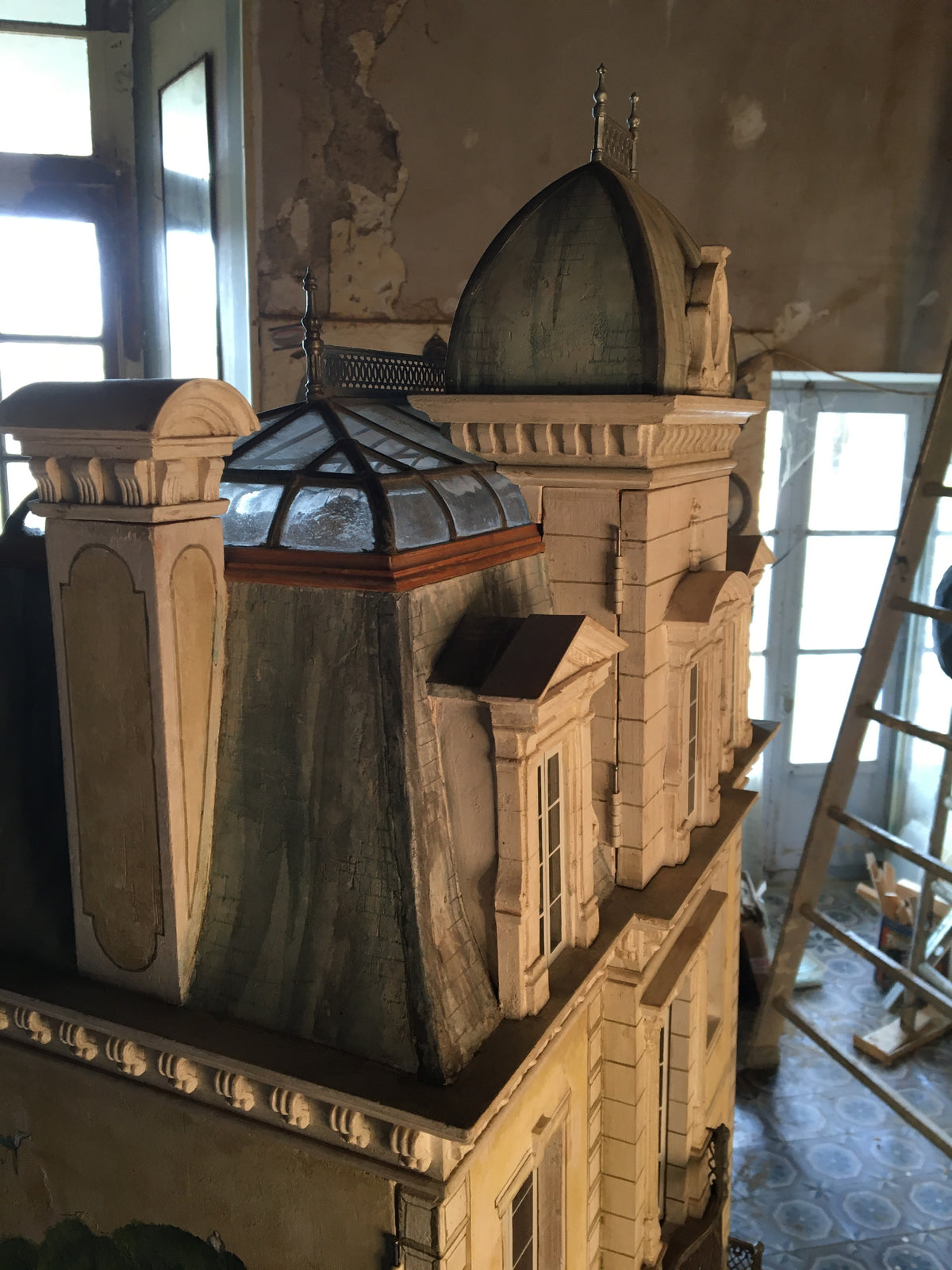 Side view of Whitestone’s domed pavilion, glass roof lantern and metal balustrade in French château style.
