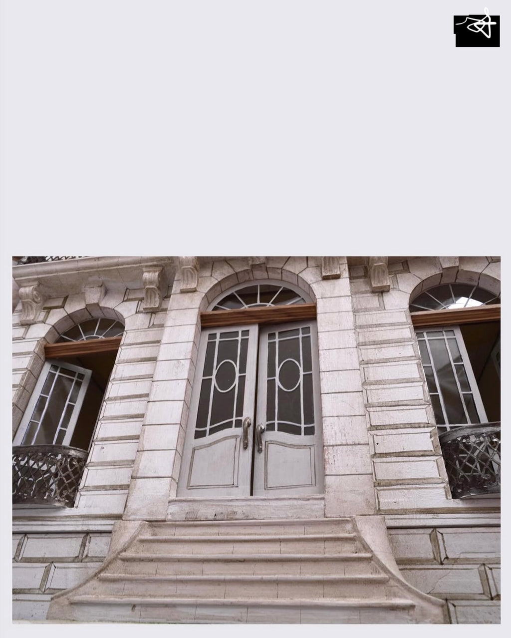 Grand entrance staircase, glazed double doors and rusticated stone façade on the handcrafted Whitestone miniature mansion.