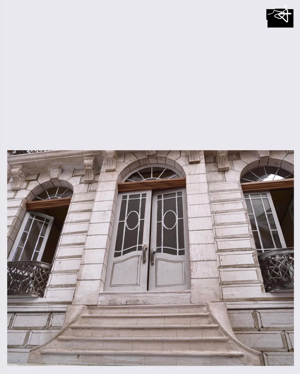 Grand entrance staircase, glazed double doors and rusticated stone façade on the handcrafted Whitestone miniature mansion.