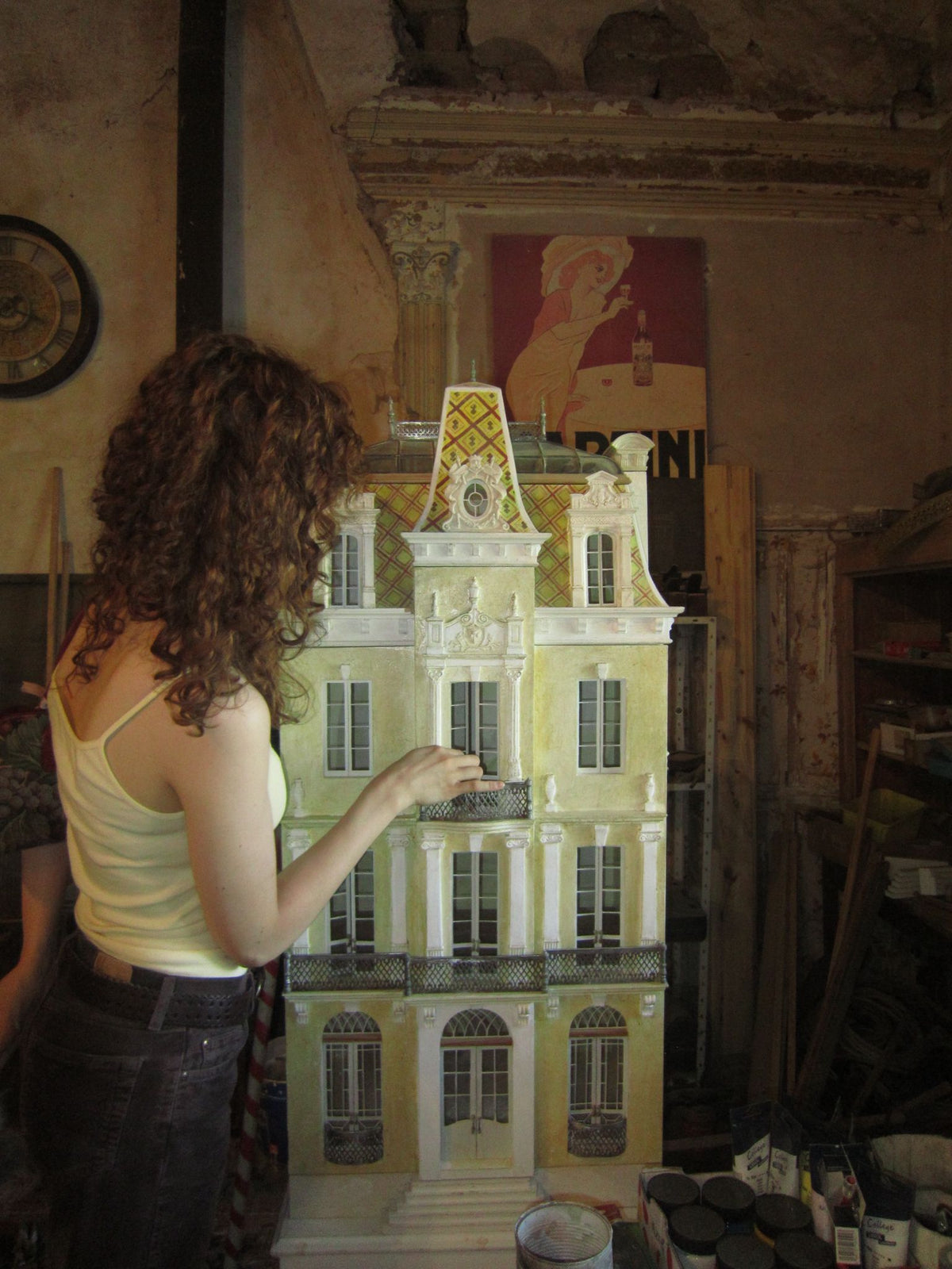 Lansdown Arts apprentice working on a one-of-a-kind handmade architectural dollhouse in the Gabian studio in southern France.